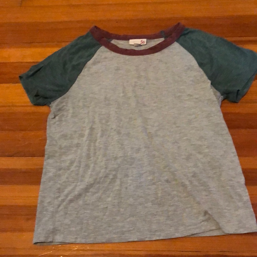 Medium burgundy and green baseball tee. Fits semi-loose